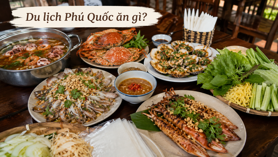 Bàn ăn Phú Quốc với hải sản, gỏi cá trích và các món địa phương.